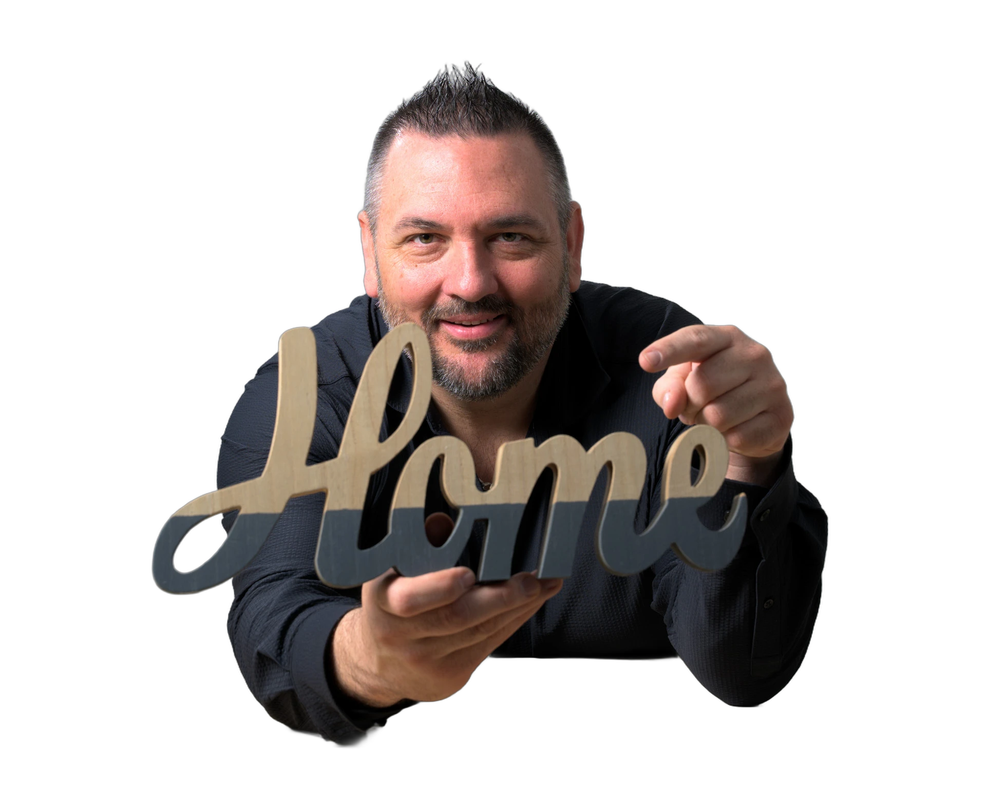 Jeff Sheppard holding a wooden 'Home' sign