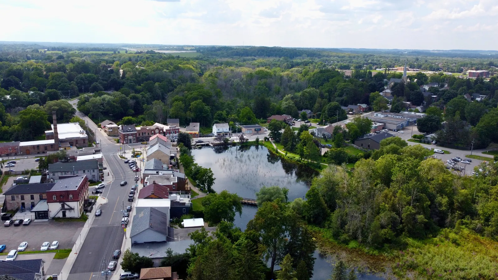 Ayr village aerial with pond